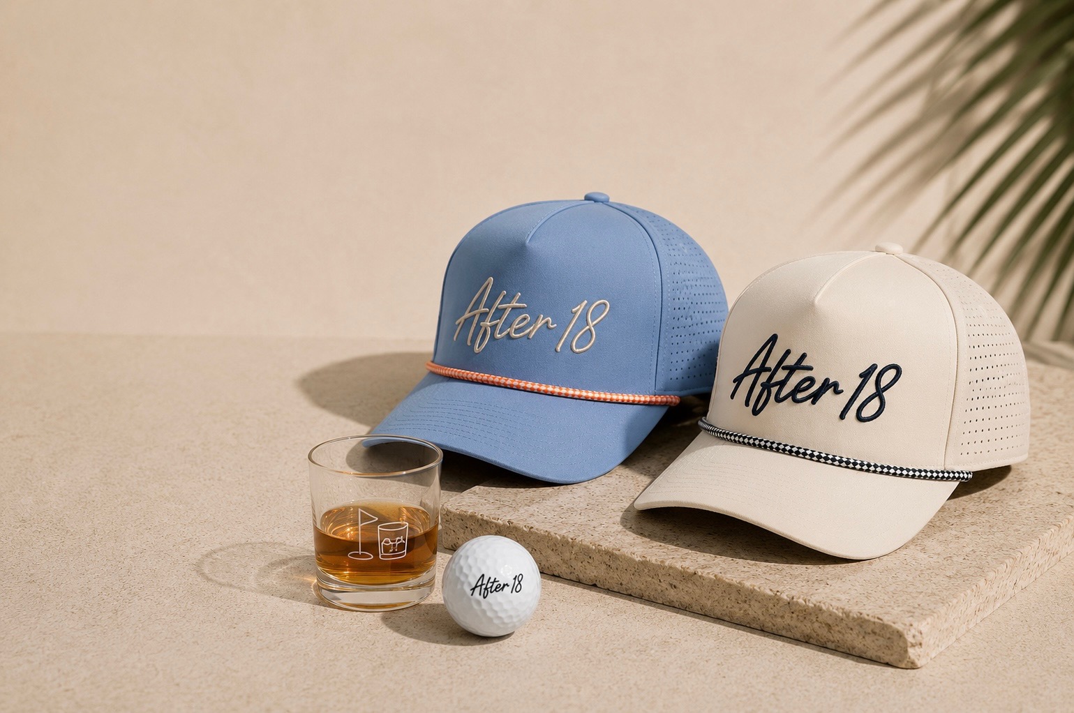 After 18 rope hats in slate and sand beside a whiskey glass and golf ball